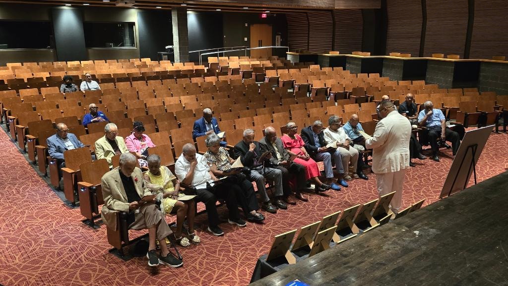 Octogenarian Recognition Luncheon — honorees assembled in auditorium
